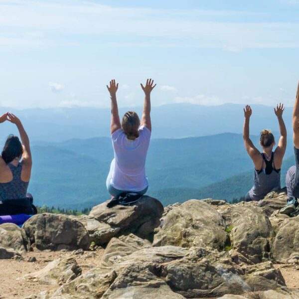 Yoga hike on rock outcrop in Gerton, NC.